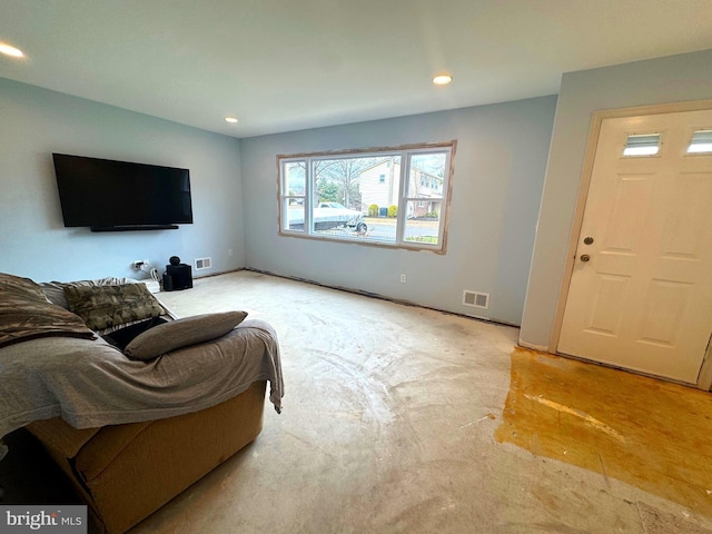 living room with recessed lighting and visible vents