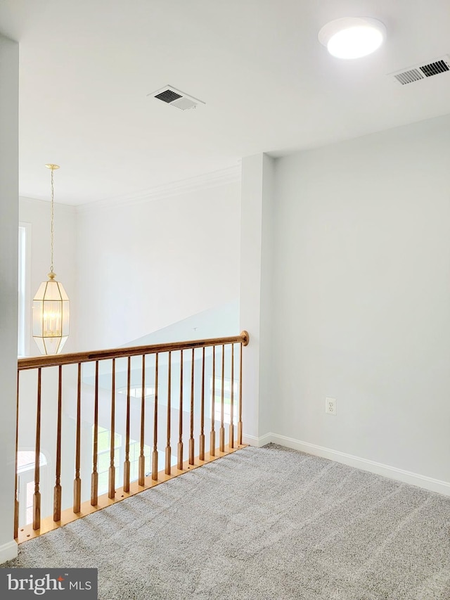 interior space with baseboards and visible vents