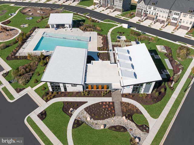 birds eye view of property with a residential view