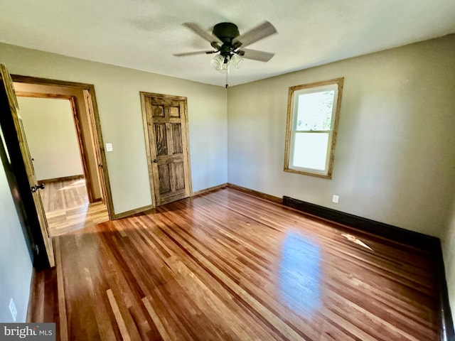 18928 National Pike, Frostburg, MD 21532 - unfurnished bedroom with a ceiling fan, wood finished floors, and baseboards