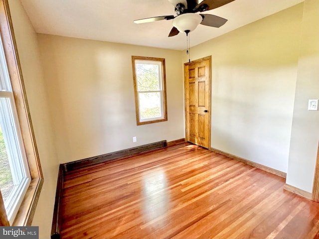 18928 National Pike, Frostburg, MD 21532 - spare room featuring baseboards, light wood-style flooring, and a ceiling fan