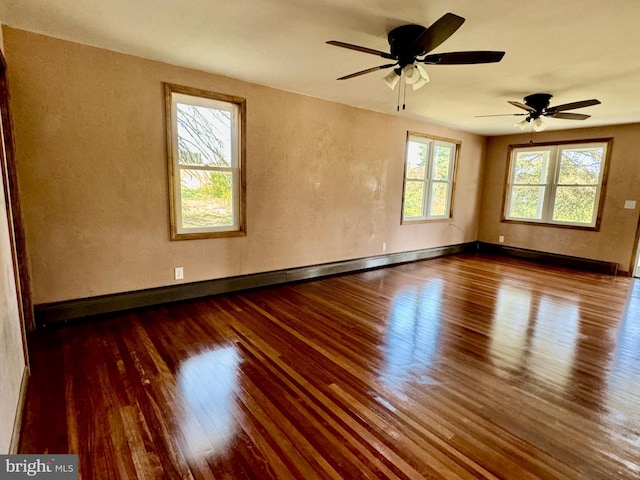 18928 National Pike, Frostburg, MD 21532 - empty room with wood finished floors, baseboards, baseboard heating, and ceiling fan