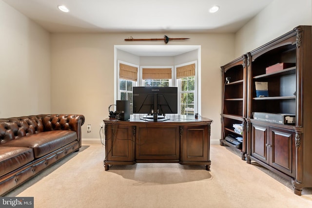 office space featuring baseboards, recessed lighting, and light colored carpet