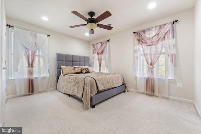 carpeted bedroom with recessed lighting, a ceiling fan, and baseboards