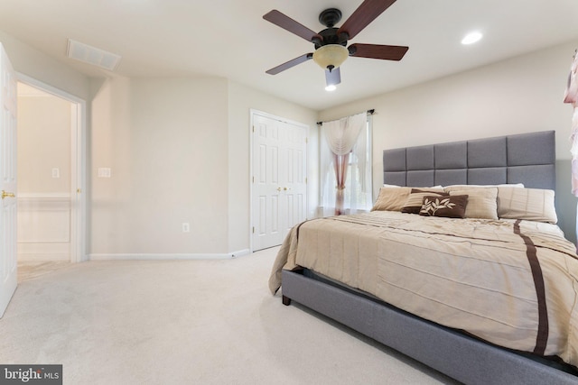 carpeted bedroom featuring recessed lighting, a closet, ceiling fan, baseboards, and visible vents