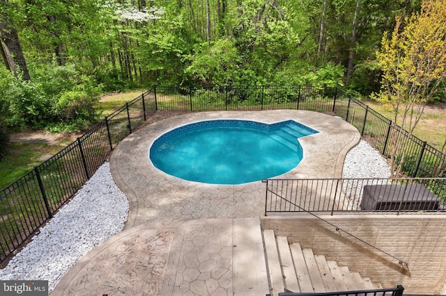 view of pool featuring fence and a fenced in pool