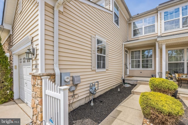 view of home's exterior featuring an attached garage