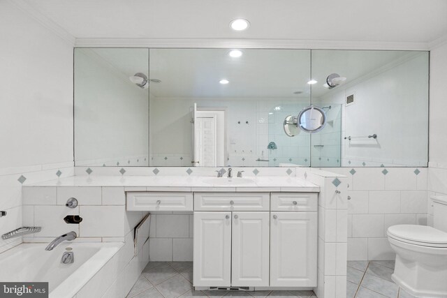 2700 Virginia Ave NW Unit 811, Washington, DC 20037 - bathroom with tile walls, ornamental molding, vanity, a bath, and recessed lighting
