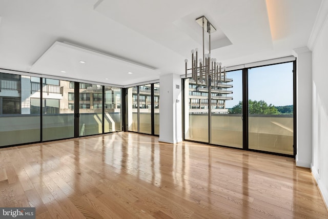 2700 Virginia Ave NW Unit 811, Washington, DC 20037 - unfurnished dining area with floor to ceiling windows, healthy amount of natural light, and wood finished floors