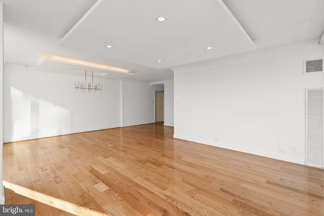 2700 Virginia Ave NW Unit 811, Washington, DC 20037 - unfurnished room with light wood-style flooring, a chandelier, and recessed lighting