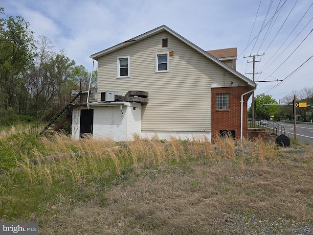 12426 Belair Rd, Kingsville, MD 21087 - view of side of property with stairway and brick siding