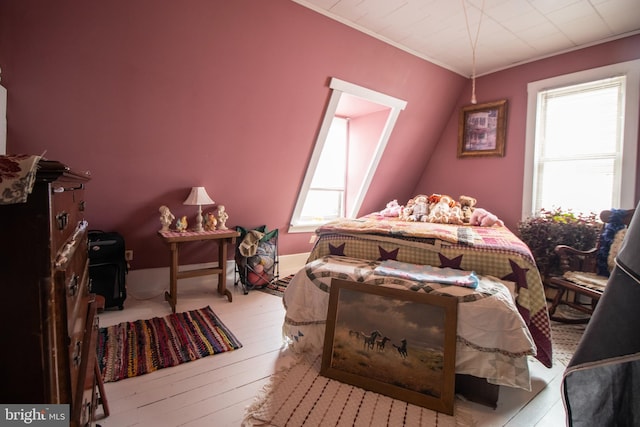 606 Ridgley St, Orbisonia, PA 17243 - bedroom featuring multiple windows, ornamental molding, and wood-type flooring
