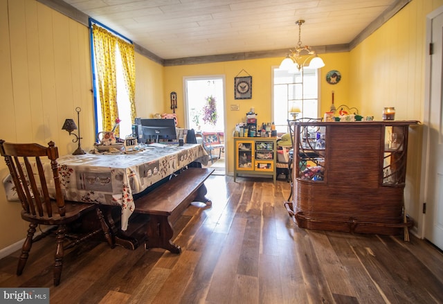 606 Ridgley St, Orbisonia, PA 17243 - dining area with baseboards, ornamental molding, a chandelier, and wood-type flooring