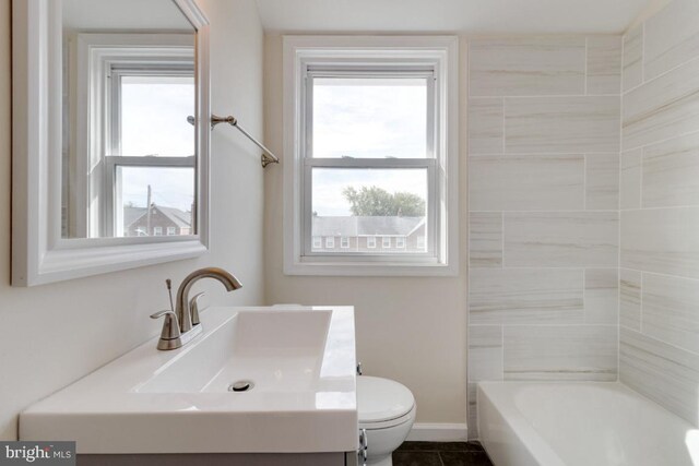 1666 Thetford Rd, Baltimore, MD 21286 - bathroom featuring tile patterned flooring, toilet, vanity, and baseboards