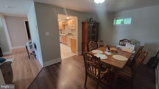 27 W Sixth St, Waynesboro, PA 17268 - dining room featuring light wood-style flooring and baseboards