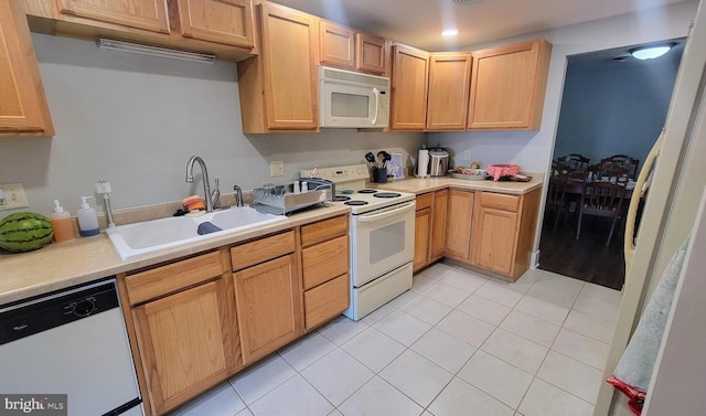 27 W Sixth St, Waynesboro, PA 17268 - kitchen with white appliances, a sink, light tile patterned flooring, and light countertops