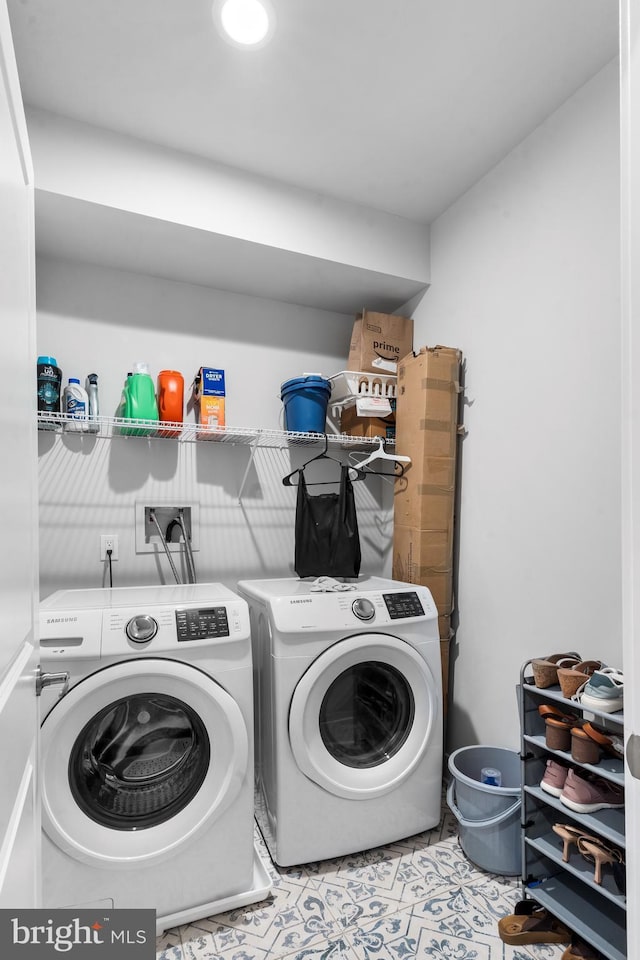 2714 W Jefferson St, Philadelphia, PA 19121 - laundry area featuring tile patterned flooring, laundry area, and washer and clothes dryer