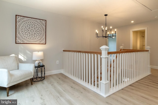 hall with recessed lighting, baseboards, and wood finished floors