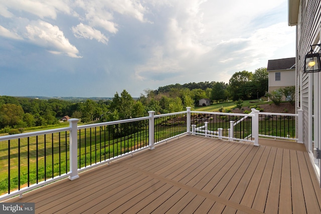 deck featuring a lawn