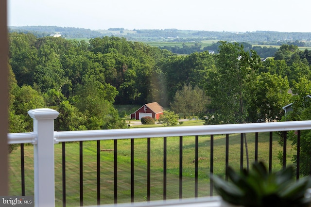 balcony with a wooded view