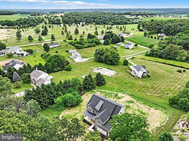 birds eye view of property featuring a rural view