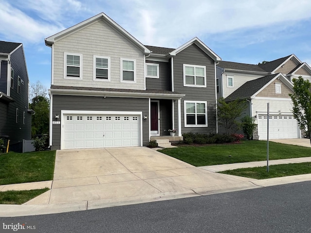 427 Whispering Elm Ln, Millersville, MD 21108 - view of front of property with a front yard, concrete driveway, and an attached garage