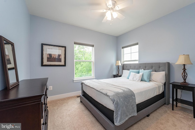 427 Whispering Elm Ln, Millersville, MD 21108 - bedroom with light colored carpet, baseboards, and ceiling fan