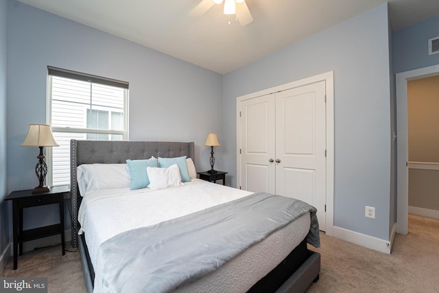 427 Whispering Elm Ln, Millersville, MD 21108 - bedroom with a closet, baseboards, light carpet, and a ceiling fan