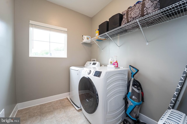 427 Whispering Elm Ln, Millersville, MD 21108 - laundry room featuring washing machine and dryer and baseboards