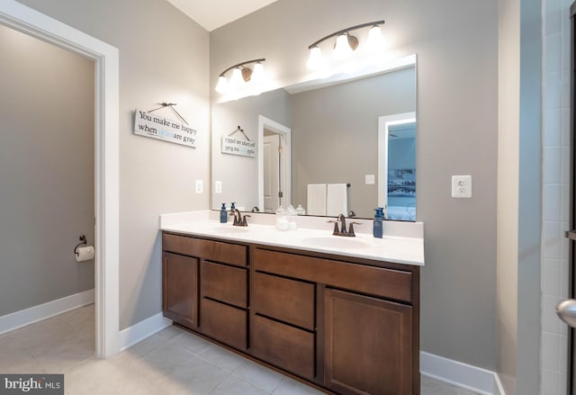 427 Whispering Elm Ln, Millersville, MD 21108 - full bath featuring tile patterned flooring, double vanity, and baseboards