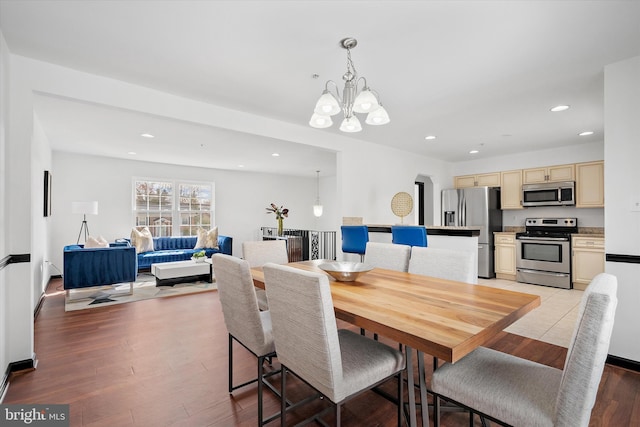 8801 Temple Hill Rd, Clinton, MD 20735 - dining room featuring recessed lighting, light wood-style floors, and a chandelier