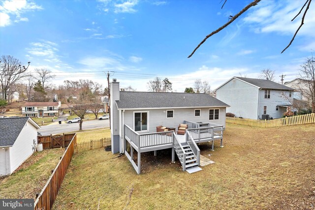 8801 Temple Hill Rd, Clinton, MD 20735 - back of property featuring a lawn, a deck, a fenced backyard, stairway, and a chimney
