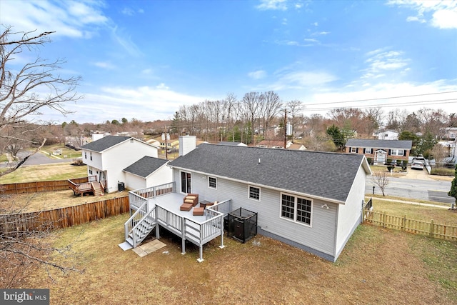 8801 Temple Hill Rd, Clinton, MD 20735 - back of property featuring a shingled roof, a fenced backyard, a lawn, and a wooden deck