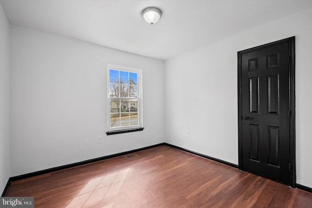 8801 Temple Hill Rd, Clinton, MD 20735 - unfurnished room featuring visible vents, wood finished floors, and baseboards
