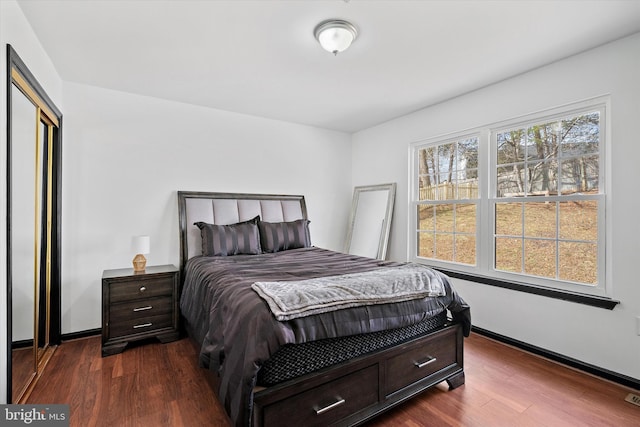 8801 Temple Hill Rd, Clinton, MD 20735 - bedroom featuring dark wood finished floors and baseboards