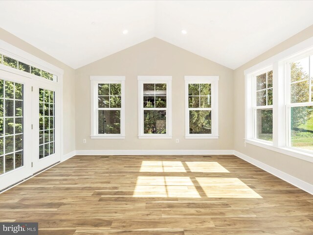 unfurnished sunroom featuring french doors