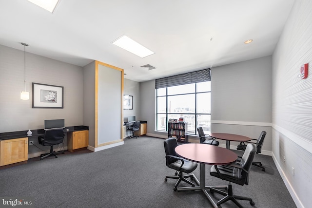 home office featuring baseboards, visible vents, and dark colored carpet