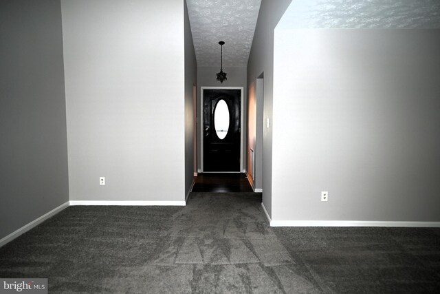 3539 Smokethorn Ct, Waldorf, MD 20602 - entryway featuring carpet flooring, a textured ceiling, and baseboards