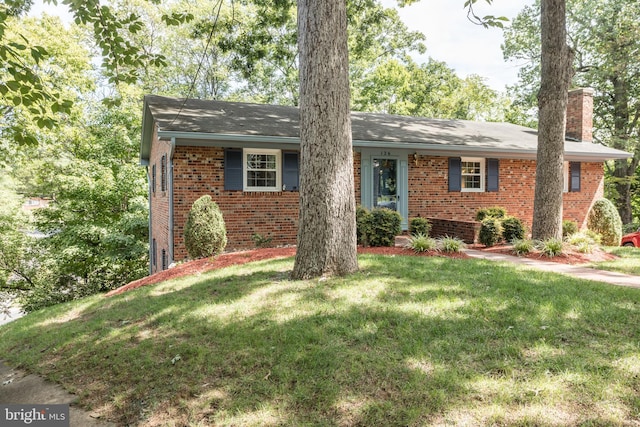 126 Armstrong Pl, Winchester, VA 22602 - ranch-style house featuring a front lawn, brick siding, and a chimney