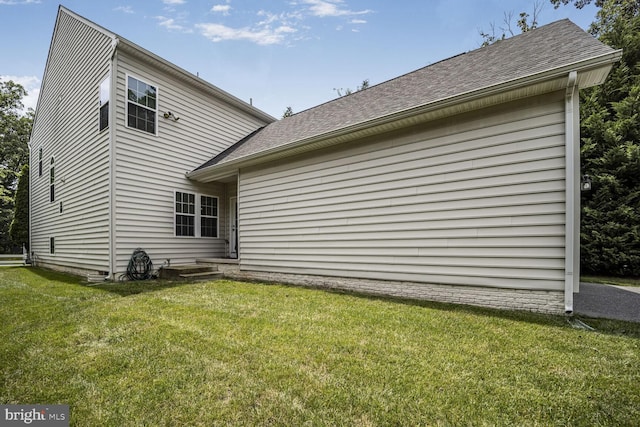 7208 Cherry Ln, Laurel, MD 20707 - rear view of property featuring a yard and roof with shingles