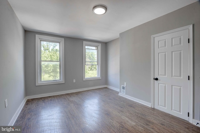 1843 W Pratt St, Baltimore, MD 21223 - empty room featuring wood finished floors and baseboards