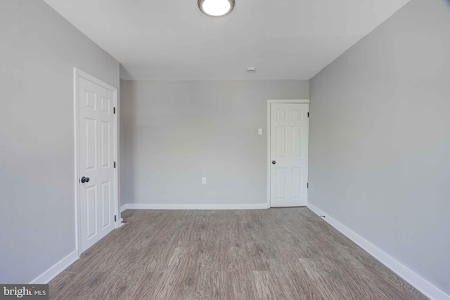 1843 W Pratt St, Baltimore, MD 21223 - spare room featuring wood finished floors and baseboards