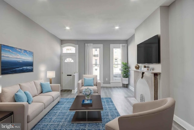 1843 W Pratt St, Baltimore, MD 21223 - living room with wood finished floors, baseboards, and recessed lighting