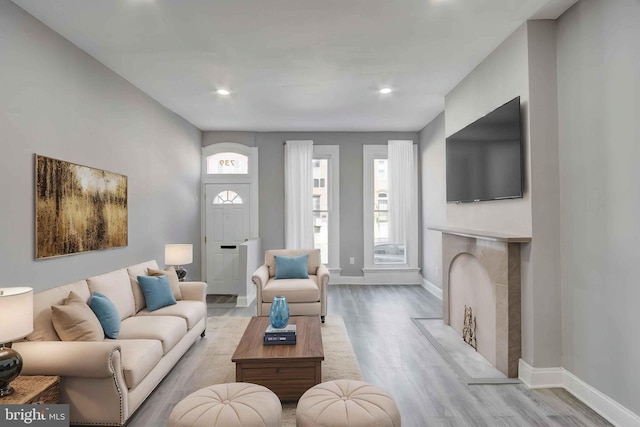 1843 W Pratt St, Baltimore, MD 21223 - living room with light wood-type flooring, baseboards, and recessed lighting