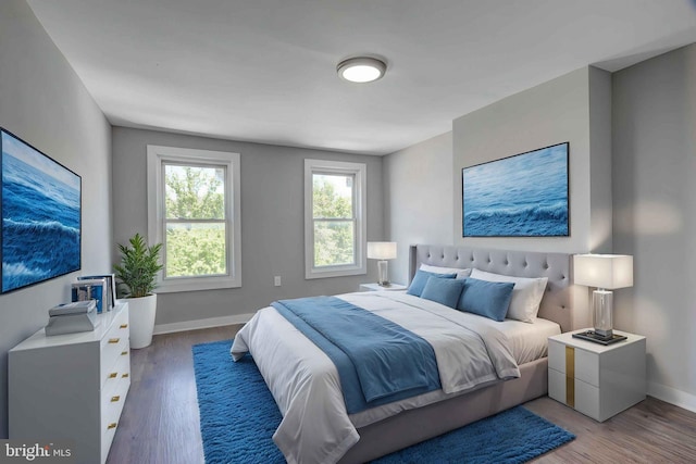 1843 W Pratt St, Baltimore, MD 21223 - bedroom featuring baseboards and light wood finished floors