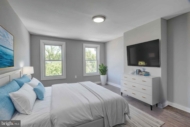 1843 W Pratt St, Baltimore, MD 21223 - bedroom featuring baseboards and wood finished floors