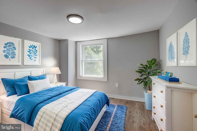 1843 W Pratt St, Baltimore, MD 21223 - bedroom featuring wood finished floors and baseboards
