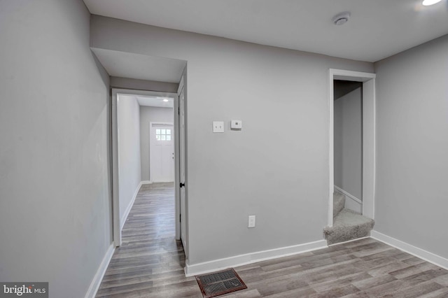 1843 W Pratt St, Baltimore, MD 21223 - interior space featuring wood finished floors, baseboards, stairs, and recessed lighting