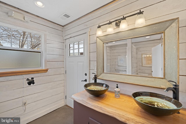 4204 Old Fincastle Rd, Fincastle, VA 24090 - full bathroom with visible vents, finished concrete flooring, recessed lighting, wooden walls, and vanity