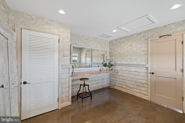 4204 Old Fincastle Rd, Fincastle, VA 24090 - bathroom with finished concrete floors, recessed lighting, wallpapered walls, and a wainscoted wall